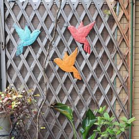 img 3 attached to 3 Pack Outdoor Garden Patio Fence Wall Art - Schwousi Metal Hummingbird Wall Decor для гостиной, спальни (оранжевый, синий, красный)