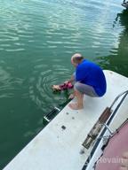 картинка 1 прикреплена к отзыву Большой розовый спасательный жилет для собак Surblue: безопасность домашних животных для плавания, катания на лодках и пляжных прогулок от Ryan Selpasoria