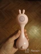 img 1 attached to 🎶 Blue Alilo Smarty Bunny Shake & Tell Musical Toy Rattle for Newborns and Infants - Soother with Lullaby Song Story, Music Player & Games review by Ada Plech ᠌