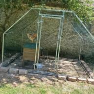 img 1 attached to Spacious And Durable Galvanized Chicken Coop With Secure Walk-In Pen Run And Cover - The Perfect Home For Your Chickens review by Bethany Baker