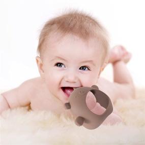 img 1 attached to RMGVG Baby Teething Toys - Teething Toys for Babies 0-6 Months and 6-12 Months - Teethers Toys for Infants - Hand Pacifier for Breastfeeding Babies (Brown)