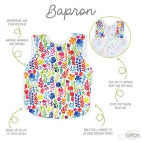 img 3 attached to BapronBaby Rainbow Watercolor Floral Bapron - The Perfect Waterproof Stain Resistant Bib for Babies and Toddlers - Machine Washable - Size 6m to 5yr