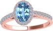 10k rose gold prong-setting 1.75 carat diamond and oval shaped blue topaz ring - maulijewels women's rings logo