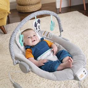 img 3 attached to MICKEY MOUSE Comfy Disney Baby Bouncer In Cloudscapes Includes Bar With 3 Cute, Plays 7 Soothing Melodies W/Auto Shut-Off, Age 0-6 Months