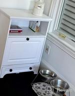 img 1 attached to Stylish White Farmhouse Pet Station With Pull Out Bowls & Storage Cabinet For Modern Pet Care review by Peter Caw