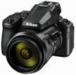 black nikon coolpix p950 camera with nikkor 83x wide optical zoom ed vr 4.3-357mm 1:2.8-6.5 logo