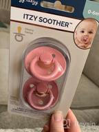 img 1 attached to Safe And Natural: Itzy Ritzy Natural Rubber Pacifiers With Cherry-Shaped Nipple And Large Air Holes, Set Of 2 In Camo & Midnight For Newborns, Ages 0-6 Months review by Margaret Ford