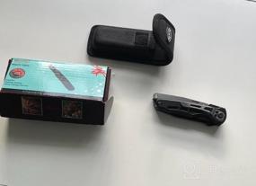 img 5 attached to Уникальная идея подарка: многофункциональный карманный нож RoverTac с зажигалкой, свистком и многим другим!