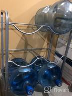 img 1 attached to Organization and Protection with Ationgle 5 Gallon Water Cooler Jug Rack - 3-Tier Bottle Holder for 6 Bottles review by Daniel Roe