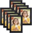8 pack ophanie picture frame set for wall and tabletop display, 5x7 photo frames for bedroom, office, and living room decoration logo