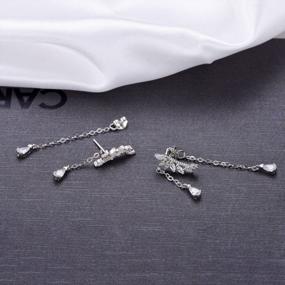 img 1 attached to Sparkle And Shine With YOQUCOL Angel'S Wings Ear Climber Earrings: Perfect For Girls And Women