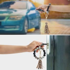 img 1 attached to Силиконовый бисерный брелок для ключей Doormoon, браслет, кольцо для ключей с накладкой для ключей от телефона, дома и автомобиля