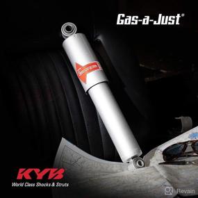 img 3 attached to 🔧 Enhance Performance with KYB KG5785 Gas-a-Just Gas Shock in Silver and White