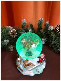 img 4 attached to Snow globe / Ball with snow / New Year's snow globe with music and lights / Santa's Flight 12x15