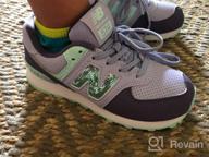 img 1 attached to 574 V1 Winter Suede Lace-up Sneaker for Kids by New Balance review by Chris Lapan