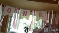 картинка 1 прикреплена к отзыву Полный набор декораций для первого дня рождения девочки в стиле принцессы - корона, баннер для стульчика, топпер для торта и цветочная корона - идеальные праздничные принадлежности для первого года ребенка. от Chad Dahl