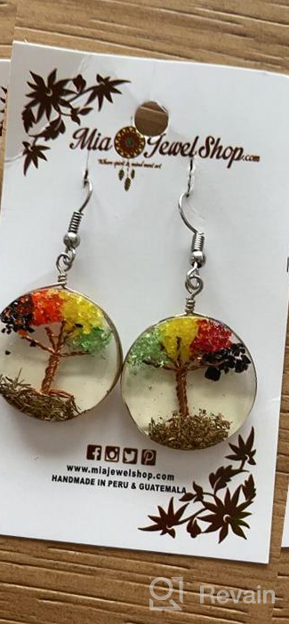 img 1 attached to Rasta Crushed Chip Stone Round Acrylic Dangle Earrings - Tree of Life Design review by Emily Perkins