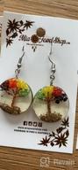 img 1 attached to Rasta Crushed Chip Stone Round Acrylic Dangle Earrings - Tree of Life Design review by Emily Perkins