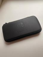 img 1 attached to 🔒 Ultimate Protection for your Nintendo Switch Lite - HORI Slim Tough Pouch (Black) - Officially Licensed by Nintendo review by Candra ᠌