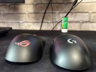 img 1 attached to 💨 ASUS ROG Keris Wireless Gaming Mouse - Lightweight Design with 16,000 DPI Sensor, Replaceable Switch Sockets, Customizable Side Buttons, ROG Omni Mouse Feet, Paracord Cable, and Aura Sync RGB Lighting review by Eh Chit ᠌