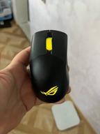 img 1 attached to 💨 ASUS ROG Keris Wireless Gaming Mouse - Lightweight Design with 16,000 DPI Sensor, Replaceable Switch Sockets, Customizable Side Buttons, ROG Omni Mouse Feet, Paracord Cable, and Aura Sync RGB Lighting review by Sakata Iori ᠌