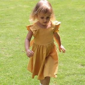 img 1 attached to Adorable Cotton Ruffle Dress For Baby & Toddler Girls With Cross Strap Back And Flutter Sleeves