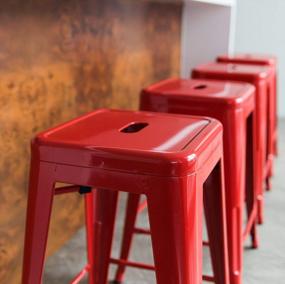 img 2 attached to UrbanMod 24 Inch Metal Barstool Set Of 4 – Counter Height Backless Stools For Kitchen Island, Breakfast, Outdoors, Pubs, Restaurants, Homes & Patios – Stackable Heavy Duty Modern Industrial Red