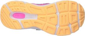 img 1 attached to New Balance Running Pigment Velocity Girls' Shoes : Athletic