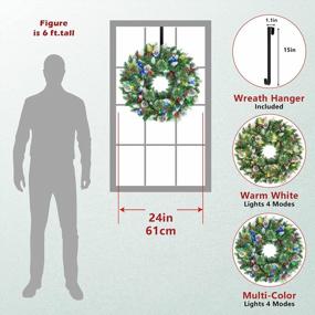 img 3 attached to SHareconn 24 Inch Prelit Artificial Christmas Wreath With 15" Hanger, Multi-Color Lights With Timer By Batteries Operated, Pine Cones And Red Berries For Front Door Wall Windows Xmas Decoration,Snow