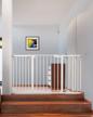 cumbor 29.5-57" mom's choice award-winning baby gate for stairs & doorways: wide, tall & safe for pets & kids! logo