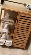 img 1 attached to Bamboo Bathroom Cabinet With Ample Storage - VIAGDO Freestanding Floor Cabinet With Doors And Side Shelves For Organized Living Spaces review by Dan Tsourvakas