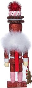 img 2 attached to 🎅 Kurt Adler 12-Inch Hollywood Red Gingerbread Nutcracker: Festive Cookie Hat Design
