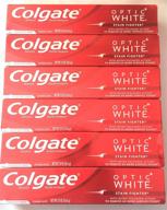 colgate toothpaste optic white fighter logo