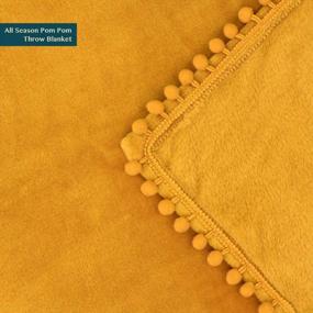 img 2 attached to PAVILIA Pom Pom Blanket Throw, Mustard Yellow Gold Soft Fleece Pompom Fringe Blanket For Couch Bed Sofa Decorative Cozy Plush Warm Flannel Velvet Tassel Throw Blanket, 50X60