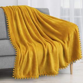 img 4 attached to PAVILIA Pom Pom Blanket Throw, Mustard Yellow Gold Soft Fleece Pompom Fringe Blanket For Couch Bed Sofa Decorative Cozy Plush Warm Flannel Velvet Tassel Throw Blanket, 50X60