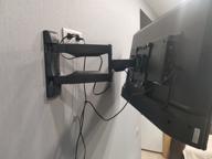 img 2 attached to Wall bracket ONKRON M4 for TV 32"-65", tilt-swivel, up to 35 kg, black review by Adam Nowak ᠌
