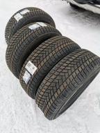 img 1 attached to MICHELIN X-Ice Snow SUV 235/65 R17 108T winter review by Adam Wielgosz ᠌
