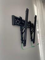 img 1 attached to Wall bracket ONKRON SN14 for TV 32"-65", inclined, up to 68 kg, black review by Jnis teins