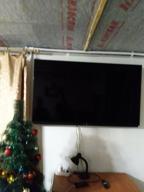 img 1 attached to Wall bracket ONKRON SN14 for TV 32"-65", inclined, up to 68 kg, black review by Petar Stoilov ᠌