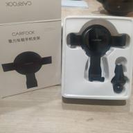 img 1 attached to Gravity holder Carfook Universal Gravity Phone Holder black review by Wiktor Tasior ᠌