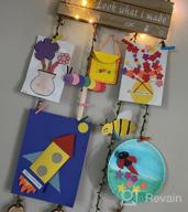 img 1 attached to 🎨 Hanging Artwork Display for Kids: Look What I Made Sign with 20 Clips and Remote Fairy Lights review by John Espindola
