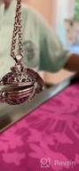 img 1 attached to 5 Pics Photo Necklace: Love Heart Locket Pendant with Wing Design – Expandable Ball Locket Necklace review by Brent Mosley