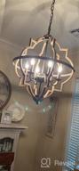 img 1 attached to Rustic Orb Chandelier With Adjustable Height - TZOE 4-Light Metal Vintage Chandelier For Dining Room, Living Room, And Kitchen review by Robert Maysey