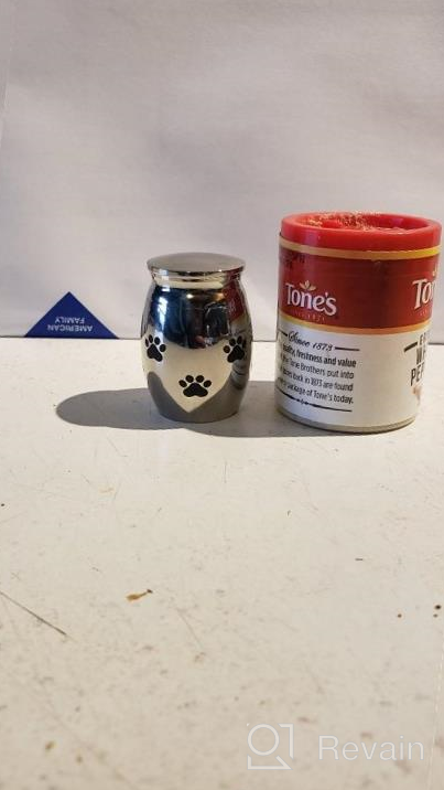 img 1 attached to Stainless Steel Mini Pet Paw Keepsake Urn - Small Cremation Urn For Pet Ashes, Memorial Urn For Dogs And Cats, Ashes Holder And Keepsake review by Sean Baller