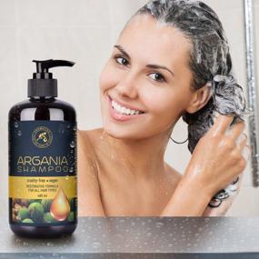 img 2 attached to Восстанавливающая формула Шампунь с аргановым маслом AROMATIKA 16,2 жидких унций - насыщен натуральным аргановым маслом и растительными экстрактами для всех типов волос - укрепляет и питает ваши волосы