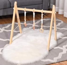 img 4 attached to 👶 Portable Wooden Baby Gym - Foldable Play Gym Frame with Teething Toys, Exercise Activity Bar - Newborn Baby Gift (Natural)