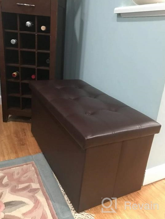 img 1 attached to 43 Inches Folding Storage Ottoman Bench - 120L Large Capacity, Wooden Divider & Faux Leather (Black) review by Craig Walters