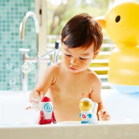 img 1 attached to 🚀 Munchkin Galaxy Buddies Illuminated Baby and Toddler Bath Toy Set with Safe Water Design - Astronaut & Rocket Ship