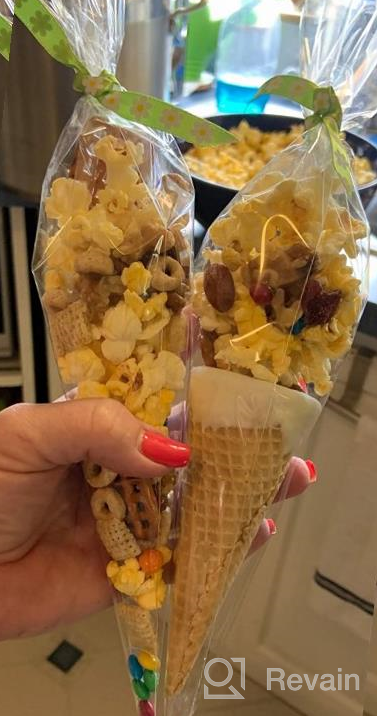 img 1 attached to Clear Cone-Shaped Treat Bags With Twist Ties - 200 Count, 4'' Size, 1.4 Mils Thick OPP Plastic Cello Bags For Christmas Candy, Popcorn, And Party Favors review by Jay Williamson