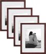 create a customizable wall display with designovation's walnut brown photo frame set - pack of 4 logo